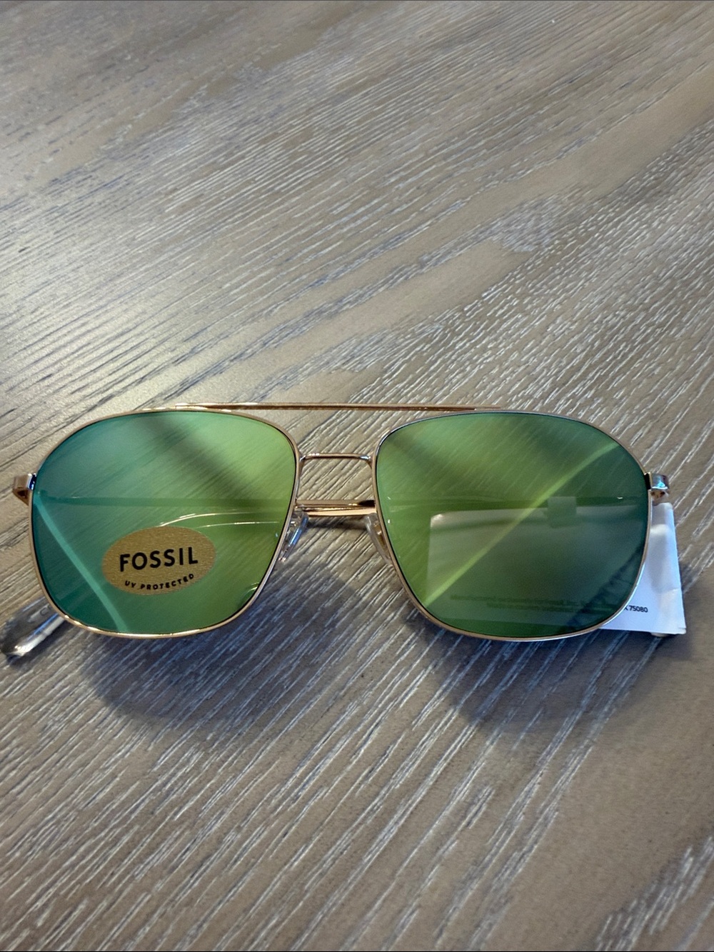 Fossil Gold Sunglasses with Green Lenses